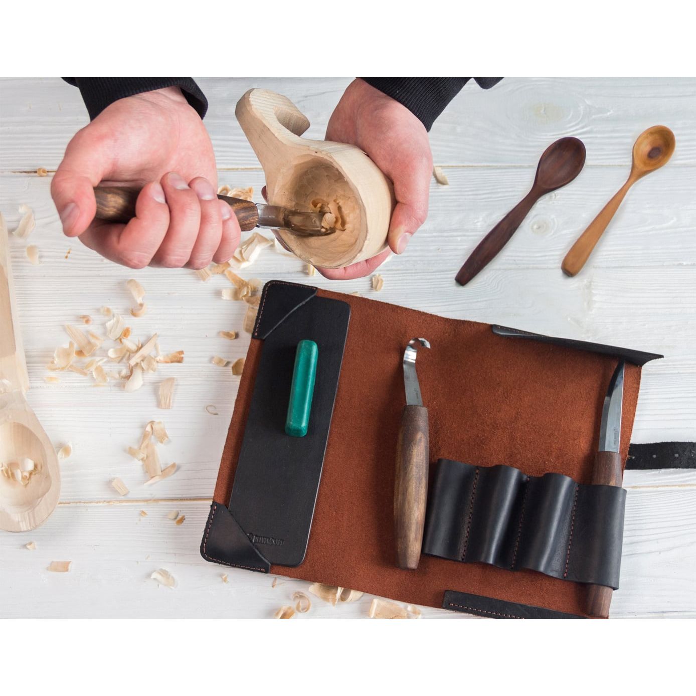 Three piece wood carving set with sharpening kit.